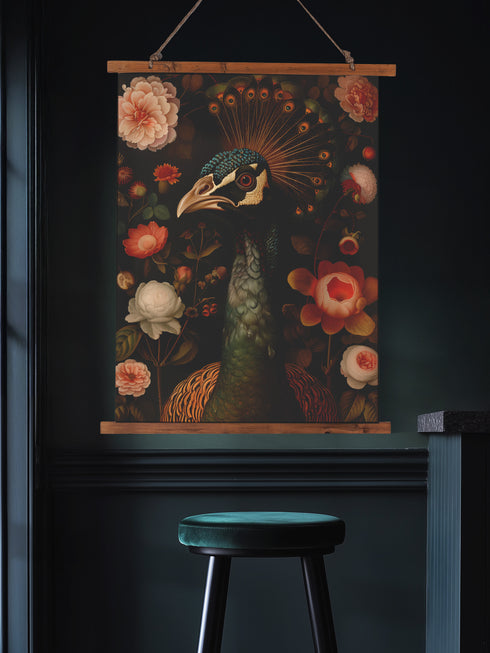 A wall tapestry featuring a detailed Victorian-style illustration of a peacock head with ornate feathers, surrounded by coral and white roses against a dark background, mounted on wooden dowels.